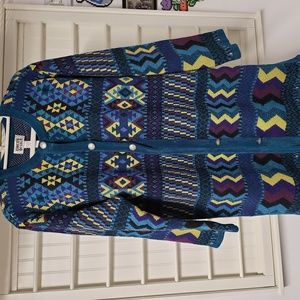 Chico's design size 2 sweater knee length. Chico sizing, one button missing